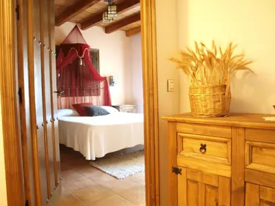 Cama o camas de una habitación en Casa Rural El Olivo