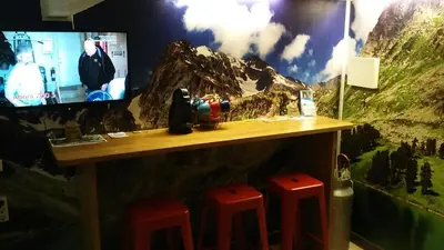Una televisión o centro de entretenimiento en Hostal Avenida