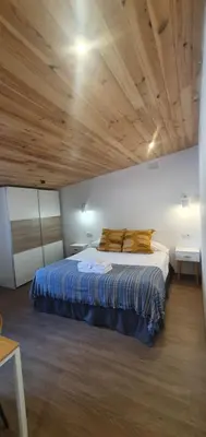 Cama o camas de una habitación en Hotel Judería Valle del Jerte