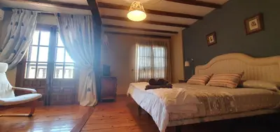 Cama o camas de una habitación en Hotel Judería Valle del Jerte