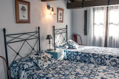 Cama o camas de una habitación en Picaza del Jerte