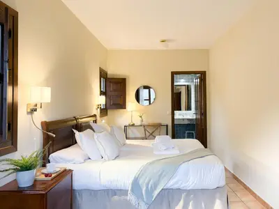 Cama o camas de una habitación en Hotel Rural Xerete