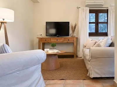 Una televisión o centro de entretenimiento en Hotel Rural Xerete