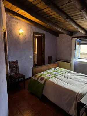 Cama o camas de una habitación en Alma de Villuercas CR-CC-0070