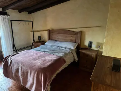 Cama o camas de una habitación en Alma de Villuercas CR-CC-0070