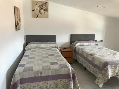 Cama o camas de una habitación en Albergue las Veletas