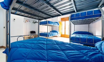 Cama o camas de una habitación en Albergue las Veletas