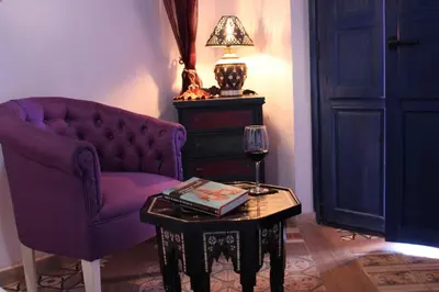 Zona de estar de Hotel la Boheme