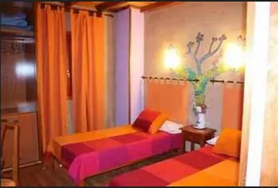 Cama o camas de una habitación en Casa Rural El Taller De Benito