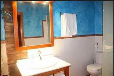 Un baño de Casa Rural El Taller De Benito