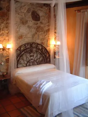 Cama o camas de una habitación en Casa Rural El Fontano CR-CC-182