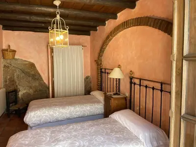 Cama o camas de una habitación en Casa Rural El Fontano CR-CC-182