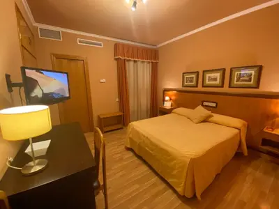 Cama o camas de una habitación en Hotel Don Juan