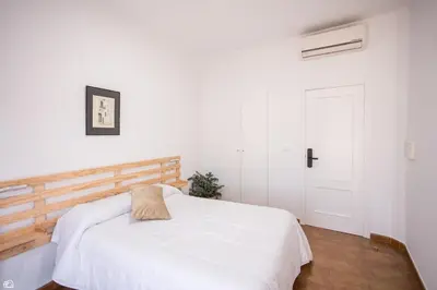 Cama o camas de una habitación en Hostal Rio