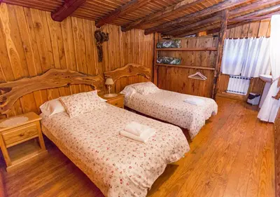 Cama o camas de una habitación en El Corralon