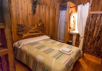 Cama o camas de una habitación en El Corralon