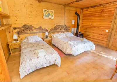 Cama o camas de una habitación en El Corralon
