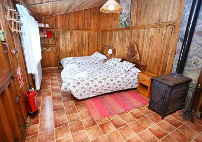 Cama o camas de una habitación en El Corralon