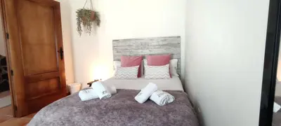 Cama o camas de una habitación en Casa Rural La Salamandrija- con chimenea, patio y barbacoa