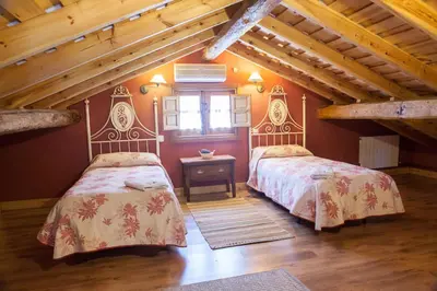 Cama o camas de una habitación en Casa Rural El Pilar