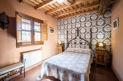 Cama o camas de una habitación en Casa Rural El Pilar