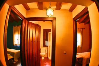 Cama o camas de una habitación en Apartamentos Rurales La Vega del Jerte