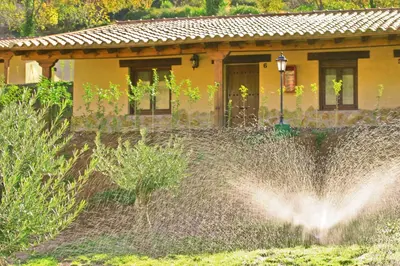Jardín al aire libre en Apartamentos Rurales La Vega del Jerte