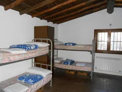 Cama o camas de una habitación en Albergue Turistico Valle del Ambroz