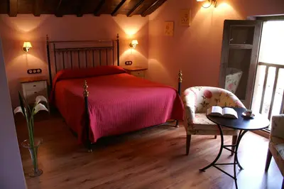 Cama o camas de una habitación en La Atalaya