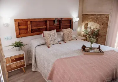 Cama o camas de una habitación en Hotel Rural El Medievo- SOLO ADULTOS