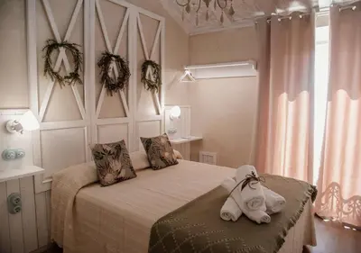 Cama o camas de una habitación en Hotel Rural El Medievo- SOLO ADULTOS