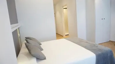 Cama o camas de una habitación en Hostal León
