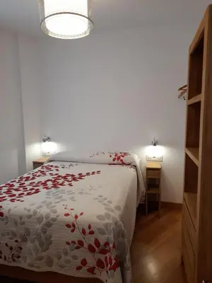 Cama o camas de una habitación en Apartamentos Doctor Fleming