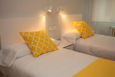 Cama o camas de una habitación en La Casa de Mozo
