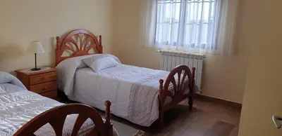 Cama o camas de una habitación en Casa Rural Las Canchaleras