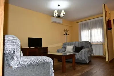 Una televisión o centro de entretenimiento en Casa Rural Las Canchaleras