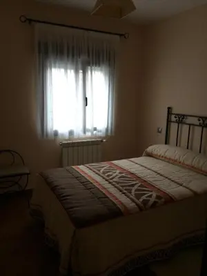 Cama o camas de una habitación en Casa Rural El Pilón