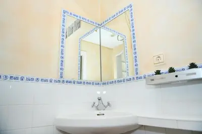 Un baño de Casa Rural El Camino de Yuste