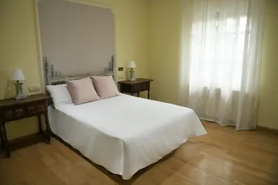 Cama o camas de una habitación en Casa Rural El Camino de Yuste