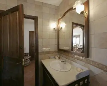 Un baño de Refugio La Covatilla I,II,III y IV