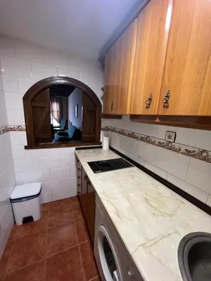 Una cocina o zona de cocina en Apartamentos Turísticos La Posada