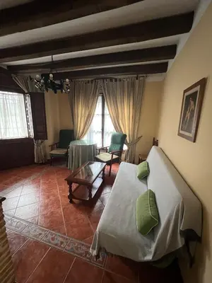 Cama o camas de una habitación en Apartamentos Turísticos La Posada
