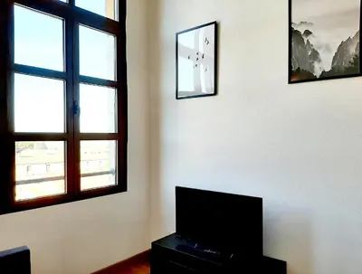 Zona de estar de Apartamentos Candelario by gaiarooms