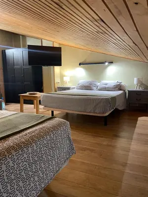 Cama o camas de una habitación en Casa Rural Jim Morrison