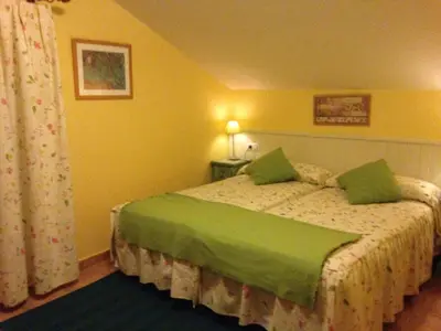 Cama o camas de una habitación en Casitas Del Huerto