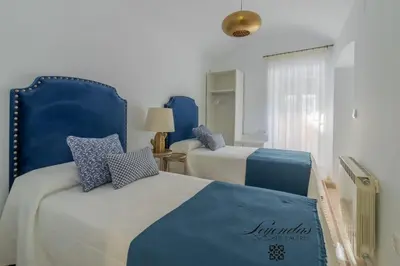 Cama o camas de una habitación en Casa Leyendas de Cáceres - en plena zona monumental