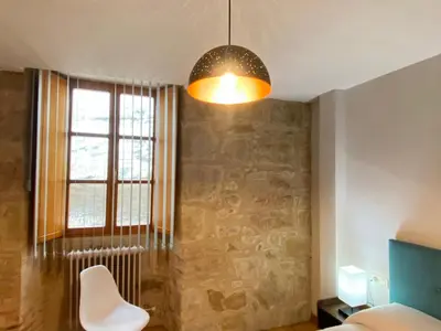 Cama o camas de una habitación en Acogedor apartamento Puente Romano !!!