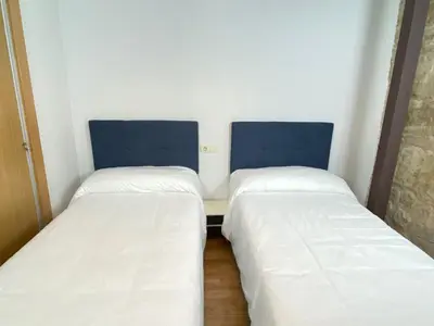 Cama o camas de una habitación en Acogedor apartamento Puente Romano !!!