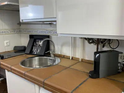 Una cocina o zona de cocina en Acogedor apartamento Puente Romano !!!