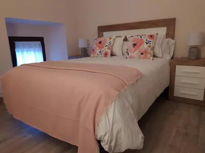 Cama o camas de una habitación en La Lagareta de Olivia